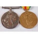 A WW I British War and Victory pair, naming 320764 PTE. B.W. SEELEY. SUFF. R., boxed. (2)