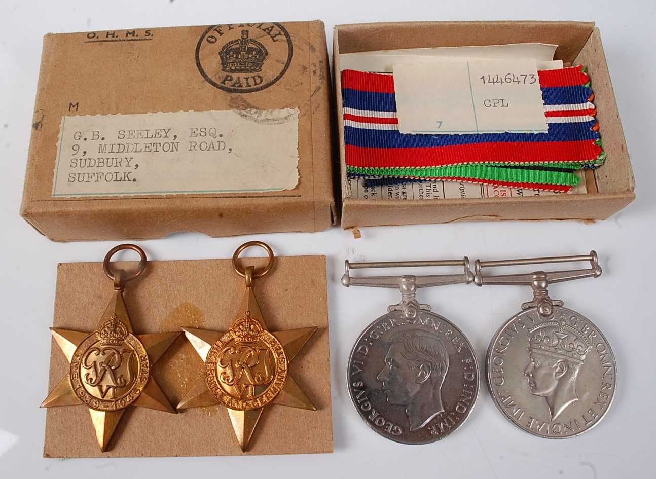 A group of four WW II medals to include 1939-1945 Star, France and Germany Star, Defence and War, in