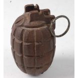 A Mills No. 23 Mk II hand grenade, the base plug marked Moorwoods.