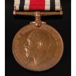 A George V For Faithful Service in the Special Constabulary medal, naming CHARLES F. ROW, in WW II