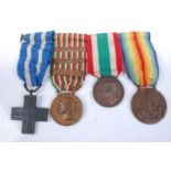 A WW I Italian medal group of four to include War Cross, War Medal with 1916,1917 and 1918 clasps,