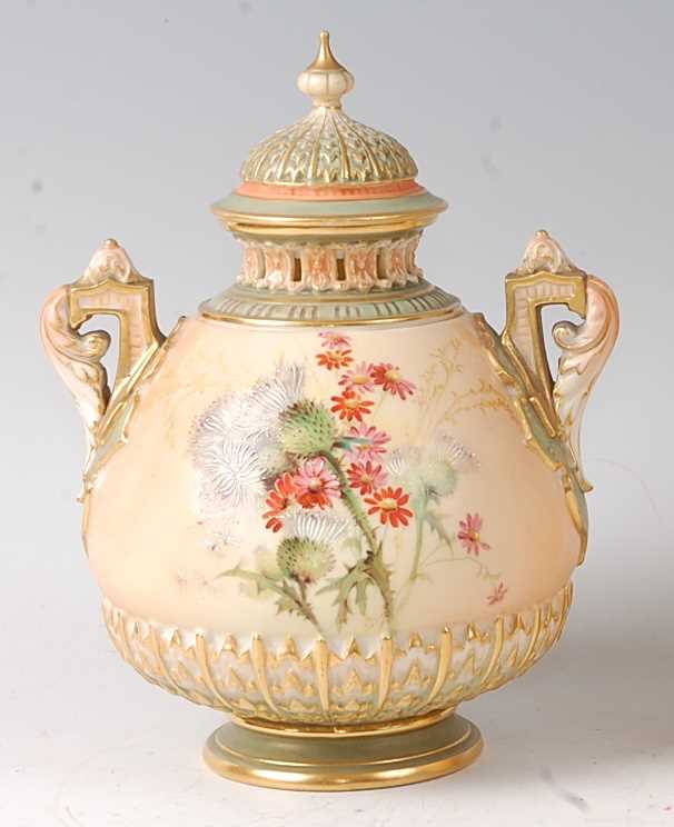 A Royal Worcester blushware pot pourri vase and cover, decorated with thistles and white flowers