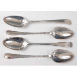 A set of four George III silver dessert spoons, in the Old English pattern, with engraved armorial