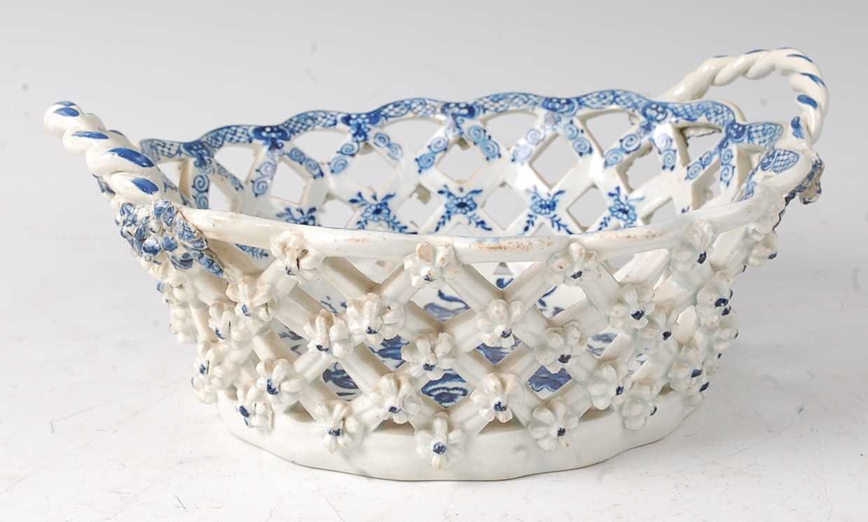 A Lowestoft porcelain chestnut basket, circa 1785, lattice-worked and blue and white printed in - Image 2 of 5