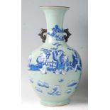 A Chinese export celadon ground baluster vase, having raised blue and white figure and cloud