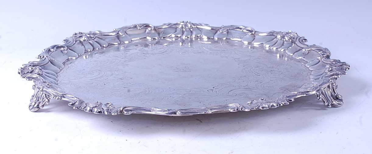 An early Victorian silver salver, having acanthus leaf cast raised piecrust rim, further C-scroll,