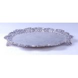 An early Victorian silver salver, having acanthus leaf cast raised piecrust rim, further C-scroll,