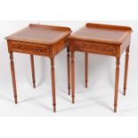 A pair of walnut and satinwood crossbanded lamp tables, each having a rectangular top above a single