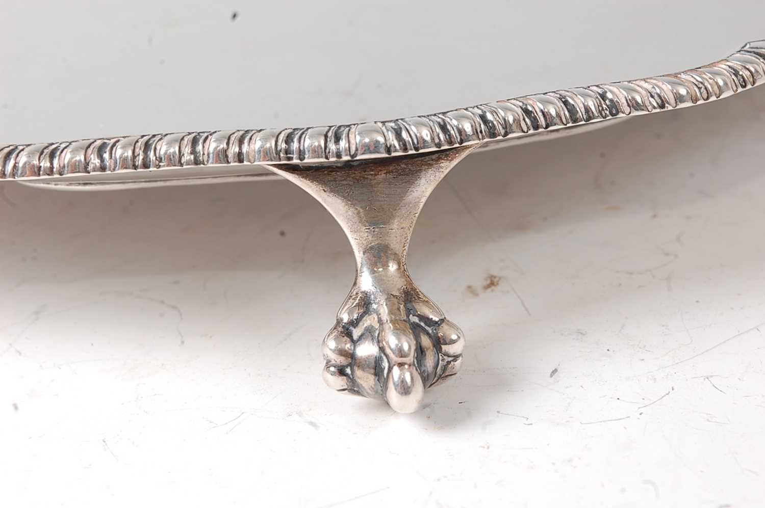 A late Victorian silver salver, having a gadrooned piecrust rim, raised on three claw and ball feet, - Image 4 of 4