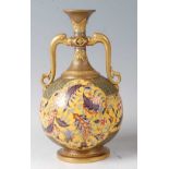 A Royal Worcester porcelain twin handled globular vase, decorated with flowers and foliage in the