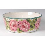 A 19th century Wemyss ware bowl, polychrome decorated with cabbage-roses, signed verso Wemyss T