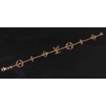 An 18ct yellow gold Louis Vuitton Idylle monogram bracelet, designed by Marc Jacobs, featuring six