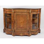 A Victorian burr walnut and marquetry inlaid credenza, having gilt metal mounts, the serpentine