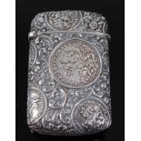 A circa 1900 Austrian silver vesta, of rounded rectangular form, the various roundels depicting St