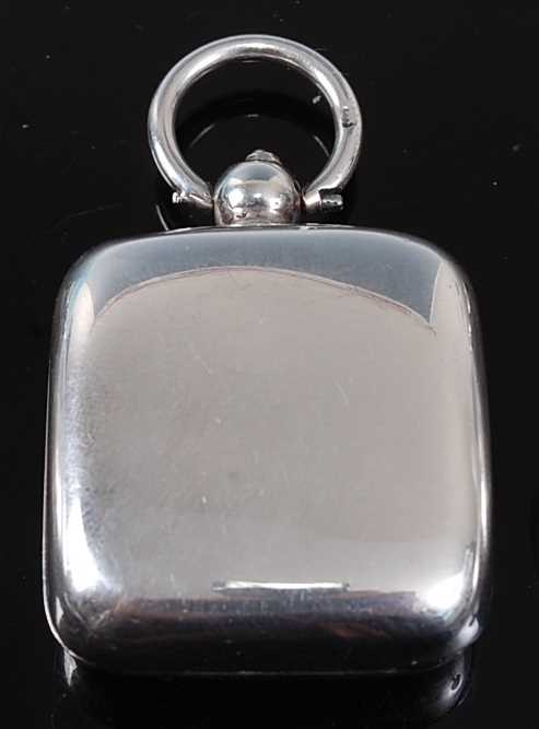 An Edwardian silver sovereign case, of plain undecorated square form with suspension loop, maker