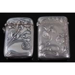 A German Art Nouveau silver vesta, of hinged rectangular form, having sinuous floral decoration,