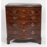 A George III style walnut and crossbanded chest, of serpentine outline, having a brushing slide