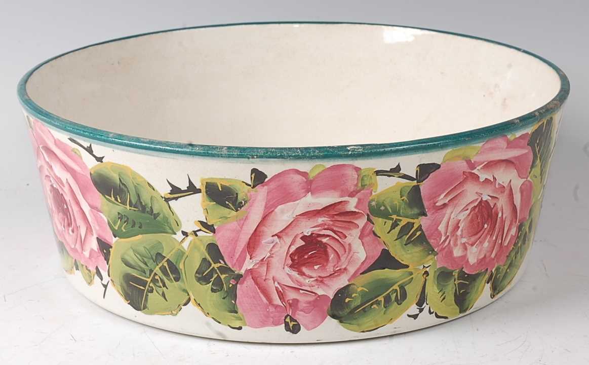 A 19th century Wemyss ware bowl, polychrome decorated with cabbage-roses, signed verso Wemyss T - Image 2 of 5