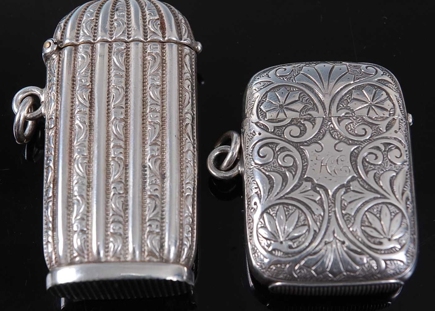 A circa 1900 French silver vesta, of elongated rectangular form, having domed cover, with