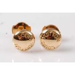 A pair of 18ct yellow gold Louis Vuitton button stud earrings, each engraved Louis Vuitton to the