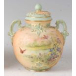 A Royal Worcester blushware pot pourri vase and cover, decorated with wildflowers and insects in a