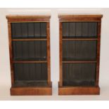 A pair of oak and burr walnut veneered freestanding open bookshelves, in the late 18th century