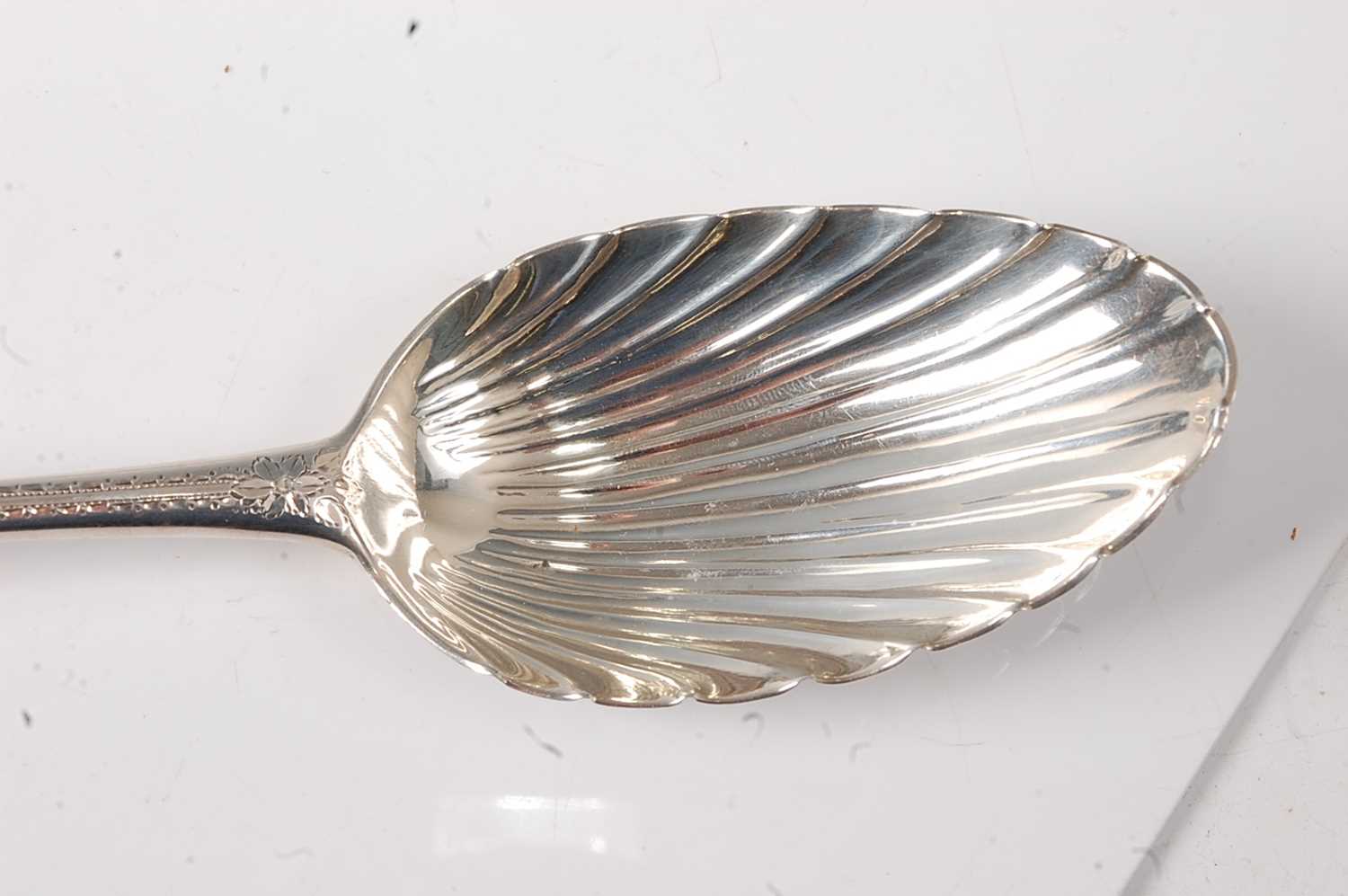 A pair of George III silver serving spoons, in the Old English pattern, each having bright cut - Image 3 of 4