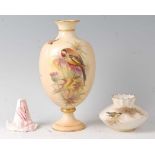 A Grainger & Co Royal Chinaworks Worcester porcelain pedestal vase, decorated with a bird amidst