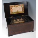 A 19th century Swiss rosewood cased music box, the 6" cylinder playing eight airs and striking on