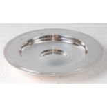 A Garrard & Co silver Armada dish, having broad flat rim, 11oz, London 1965, in original fitted