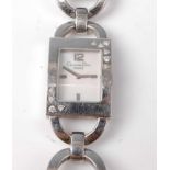 A lady's steel Christian Dior quartz wristwatch, having rectangular mother of pearl dial and bezel