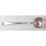 A George III silver soup ladle, in the Old English pattern with bright cut feather banding and shell