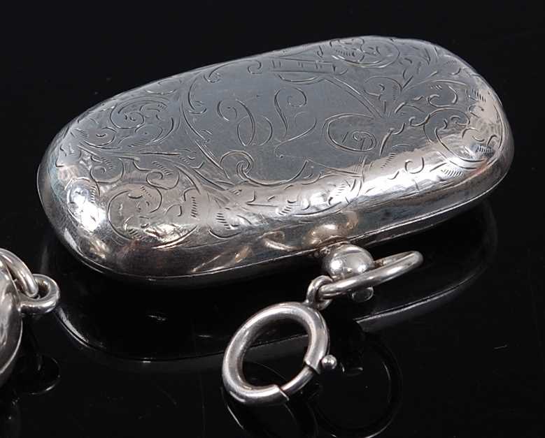 A George V silver double sovereign case, of rounded rectangular form, having all-over foliate