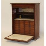 A Victorian walnut and burr walnut tambour fronted dentist's cabinet, the tambour opening to