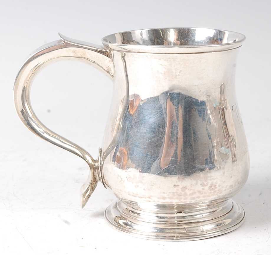 An early George II silver bell shaped small tankard, being later monogrammed, raised on an ogee - Image 3 of 4