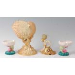 A Royal Worcester Nautilus shell, heightened in gilt on a shaded blush ground, shape No.94, circa