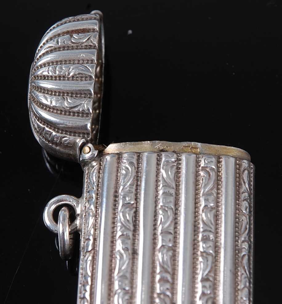A circa 1900 French silver vesta, of elongated rectangular form, having domed cover, with - Image 2 of 4
