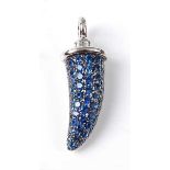 An 18ct white gold sapphire horn pendant by Theo Fennell, comprising 63 round faceted sapphires in