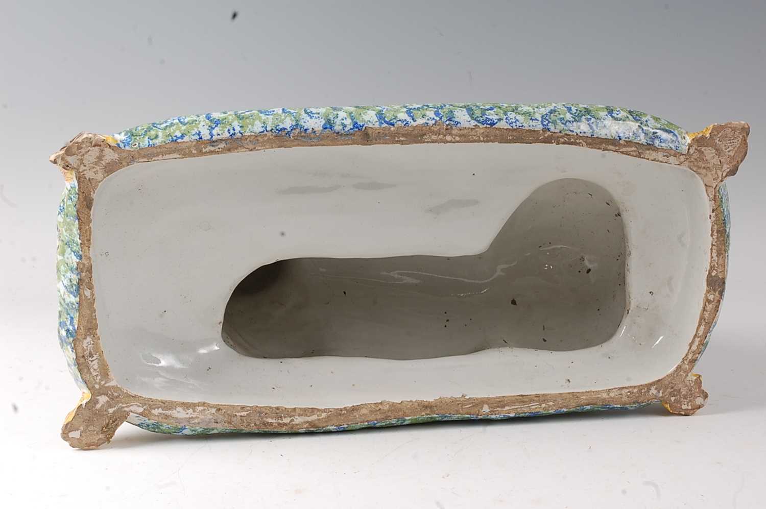 A French faience model of a recumbent pug dog upon a cushion, having all-over sponged decoration ( - Image 3 of 3