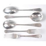 A set of four silver soup spoons, maker Walker & Hall, Sheffield 1939, 19cm; together with three