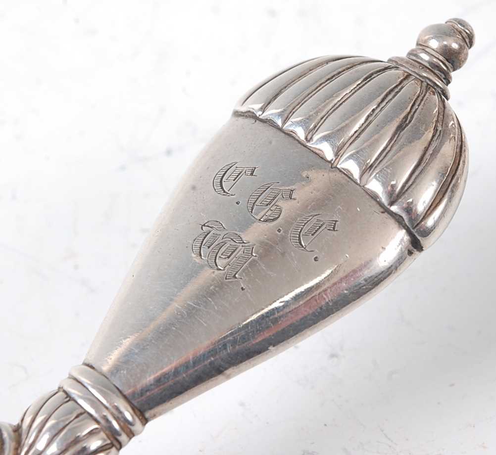 A William III silver chamberstick, of circular form with gadrooned border, the scroll mounted - Image 2 of 4