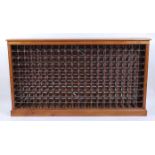 A contemporary burr oak, oak and crossbanded wine rack, with the capacity to hold 200 bottles, the