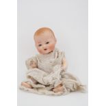 A late 1920s / early 1930s Armand Marseille 'My Dream Baby' bisque headed baby doll, with sleeping