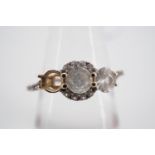 A 9ct gold and white sapphire dress ring, L 1/2, (one stone lacking), 1.7g