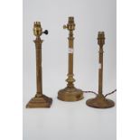 Three early 20th Century brass columnar table lamps, (tallest 37 cm)