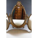 A triple dressing table mirror