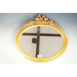 A small gilt oval mirror, 46 cm