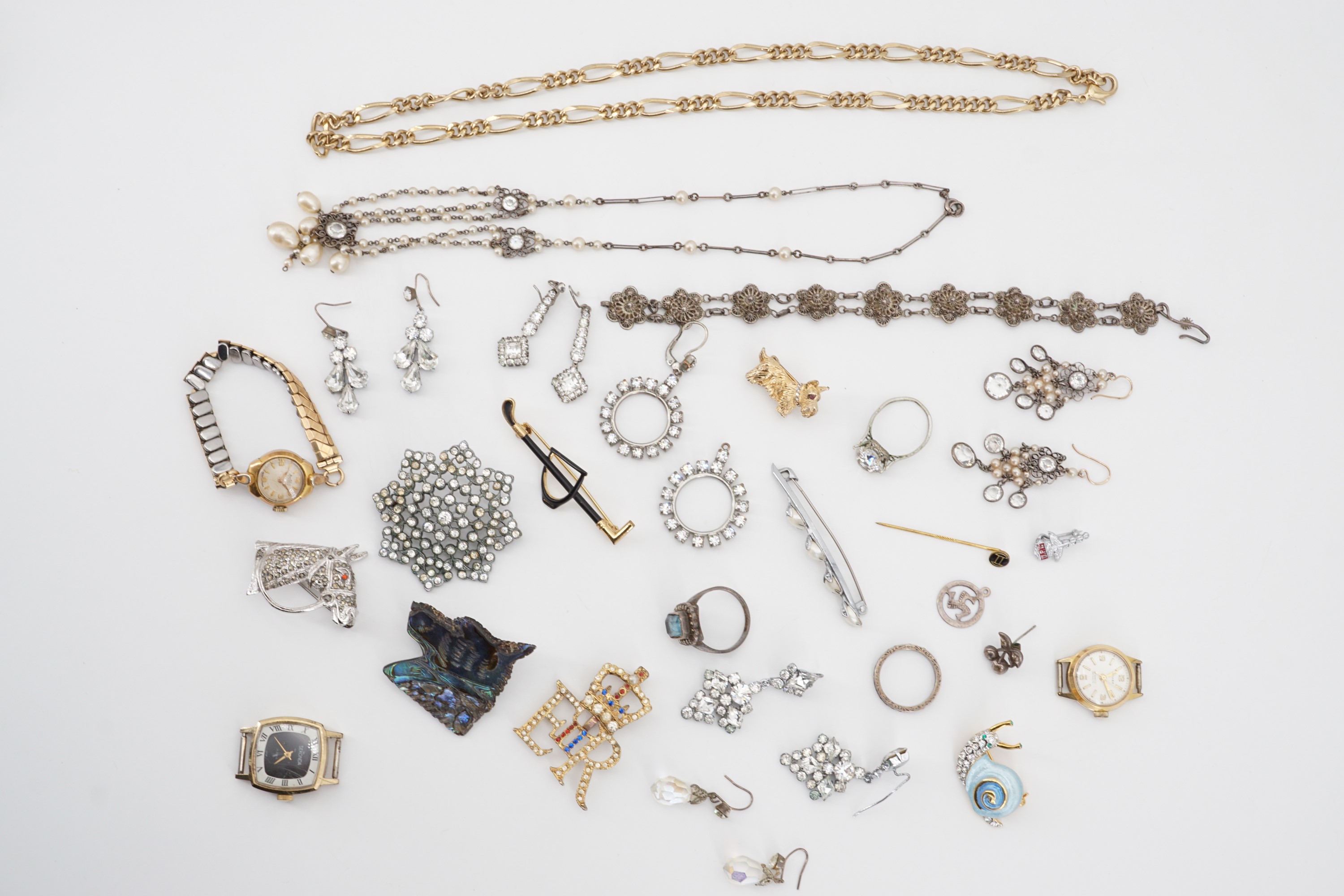 Vintage costume jewellery, including paste ear pendants, brooches, a white metal filigree