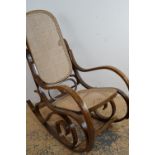 An Art Nouveau style bentwood rocking chair, circa 1960s