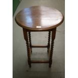 An oak occasional table, 49 x 72 high